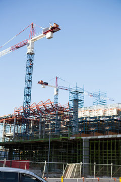 Crane and building construction site