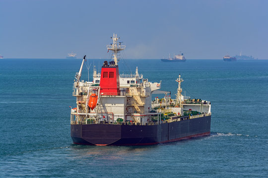Crude oil tanker underway in sea.