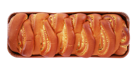Loaf of braided sweet bread with vanilla filling isolated on white background