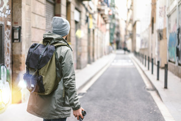 Male tourist with retro camera