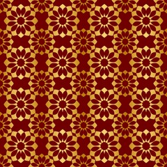 Gold and red background with seamless pattern, suitable as wrapping paper.Gold and red paper with seamless abstract pattern. Imitation of gold.