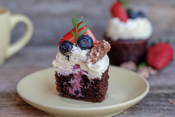 chocolate cupcake with strawberries