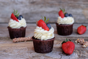 chocolate cupcake with strawberries