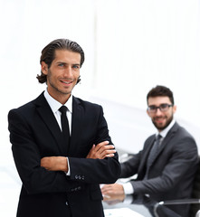 Fototapeta premium Portrait of businessman standing in office