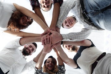 Obraz premium business team with hands clasped together