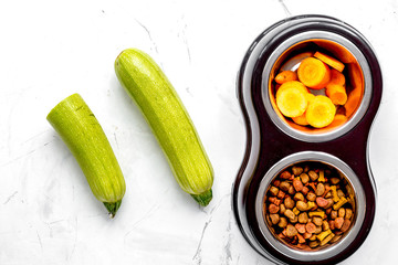 organic pets food with zucchini and carrot on table background t