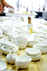 Fototapeta na wymiar workshop production of ceramic tableware finished products