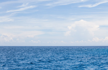Nature background of Blue sea water and sky with cloud © torsakarin