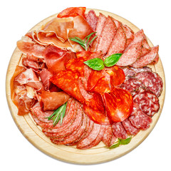 Cold meat plate with salami and chorizo sausage on wooden board