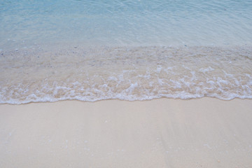 Fototapeta na wymiar Soft wave on sandy beach. concept for summer season.