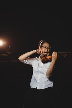 Female student playing violin