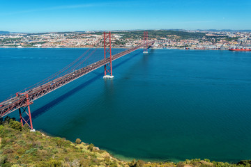 View over Tagus river and the 25th April Bridge in Lisbon, Portugal