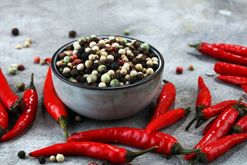 red hot bird chili pepper with pepper corns