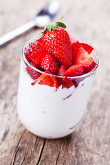 Glass Of Homemade Yogurt With Strawberries