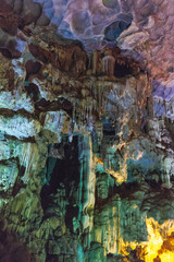 Inside Dong Thien Cung Cave that decorated with artificial green lights at Ha Long Bay. Quang Ninh, Vietnam.