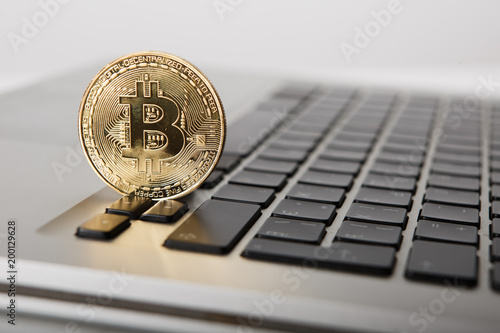 Golden Bitcoin New Virtual Money On Notebook A Visual Golden Bitcoin New Virtual Money On Notebook A Visual Representation Of Digital Cryptocurrencies