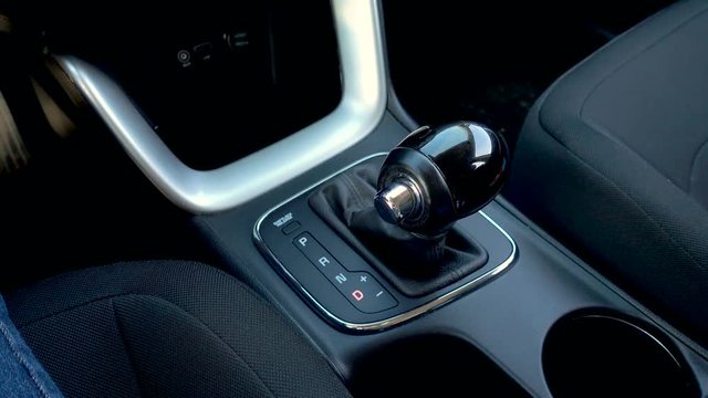 Automatic transmission, automatic gear shift. Shift knob in car.  Video without stabilization