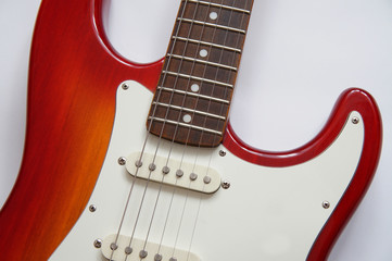 red electric guitar with a white deco