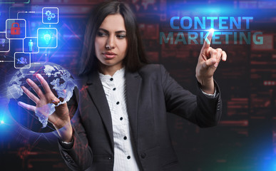 The concept of business, technology, the Internet and the network. A young entrepreneur working on a virtual screen of the future and sees the inscription: Content marketing