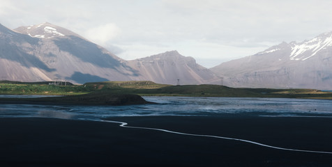 Typical Iceland landscape with road and mountains. Summer time
