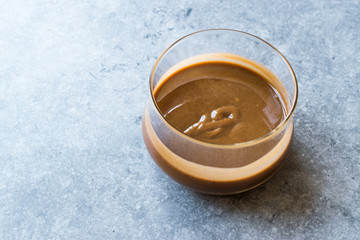 Turkish Tahin Pekmez / Tahini and Molasses in Glass Bowl.