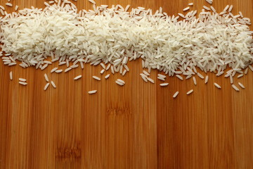 Jasmine rice on bamboo board, copy space