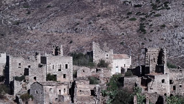 Greece Vatheia village. Architectural and historical old traditional abandoned tower houses in Vathia on Mani Peninsula. Laconia Peloponnese, Europe 4K