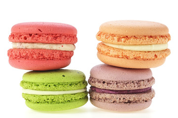 Different colored macaroons isolated on white background