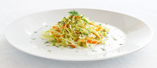 a plate with fresh vegetable salad