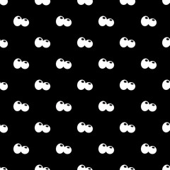 Seamless pattern of cartoon eyes in the dark.