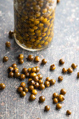 Green peppercorn in brine.