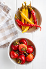 Pickled hot chili peppers.