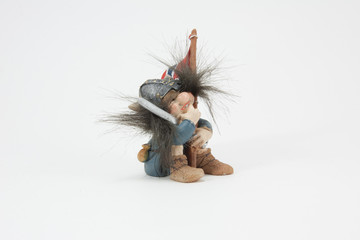 Norwegian troll figure isolated on white background