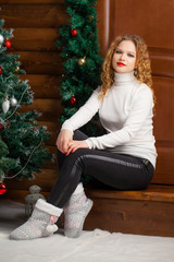 portrait of a young girl in a christmas interior