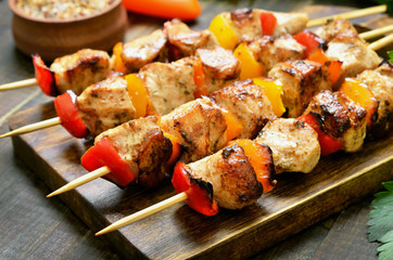 Grilled chicken on bamboo skewers