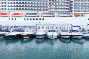 Cruiseship with yachts