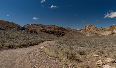 Titus Canyon Road winding through Grapevine Mountains in the Mojave Desert at Death Valley National Park California