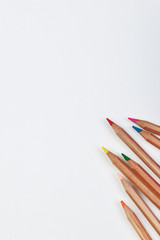 Fototapeta premium Background from color pencils on white background