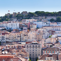 View of Alfama, the old neighborhood of Lisbon and and St. George's Castle, from the Santa Justa Lift