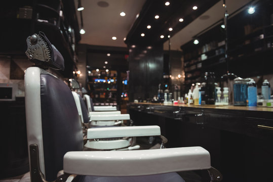 Barber chair arranged in a row