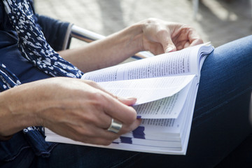 Woman reading a guidebook