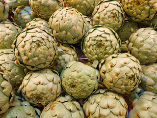 Some artichokes are waiting to be sold