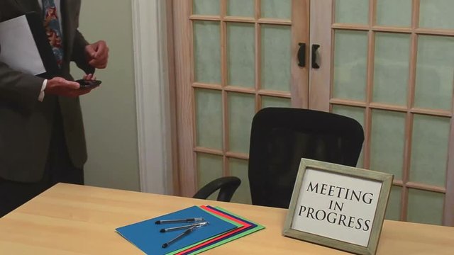 people leaving meeting in progress