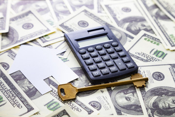 Fototapeta premium Cardboard house,calculator and key