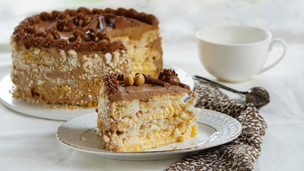 homemade kiev cake, dacquoise cake with butter cream and hazelnuts