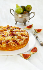 corn flour pie with figs, streusel, gluten free, without wheat, white bakeground silver 