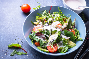 Fresh green salad top view.