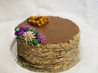 homemade kiev cake, dacquoise cake with butter cream and hazelnuts