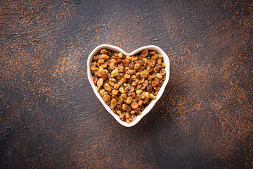 Raisins in heart shape bowl 