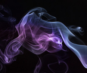 Colored smoke on black background